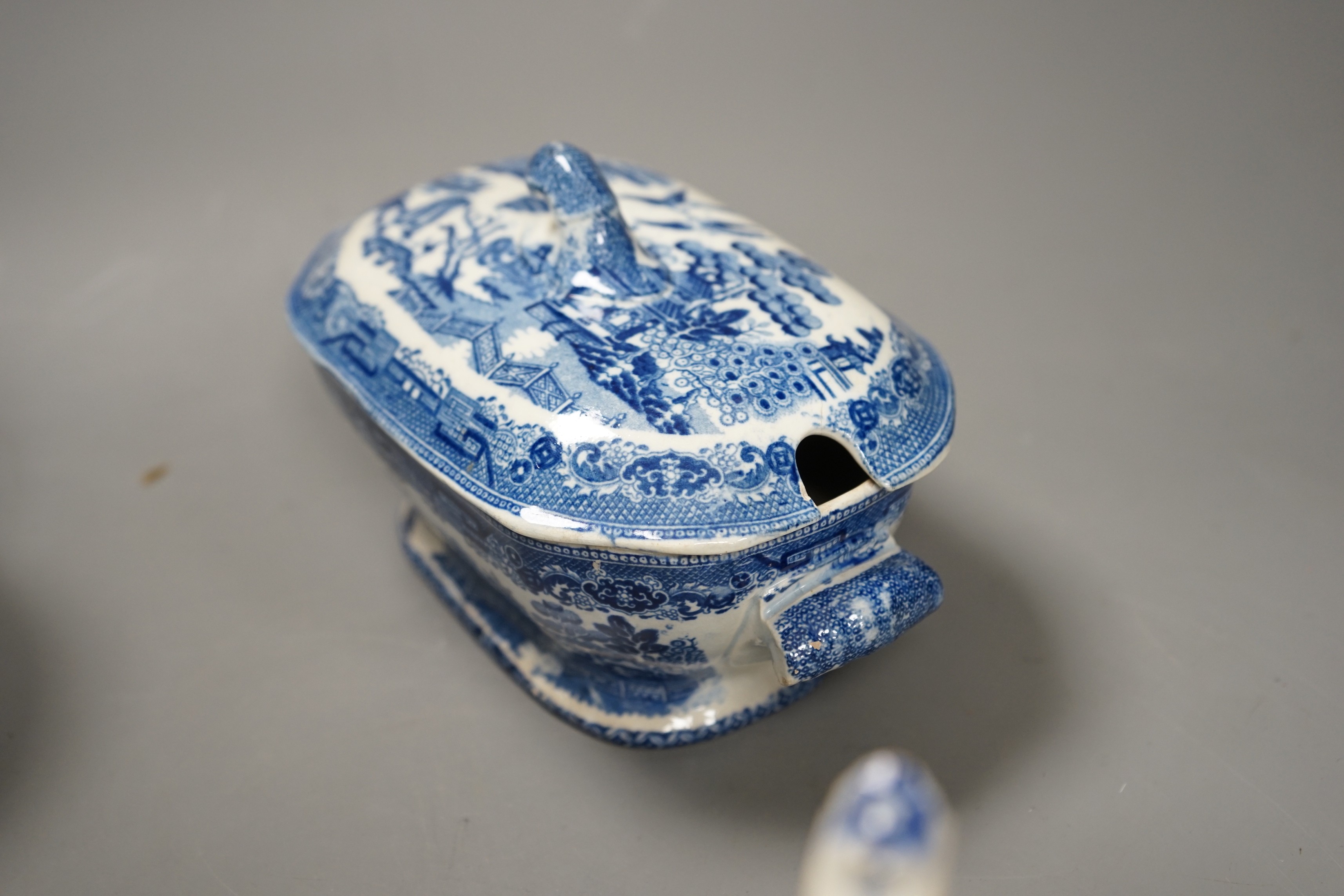 A Chinese famille rose jar and cover, another jar and two English pottery pieces